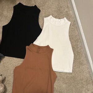 Sleeveless Black, White, and Rose Tops